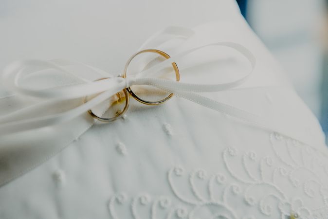 Golden wedding rings on linen textile
