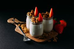 Glass bottles with milk and walnuts