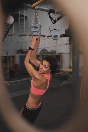 Athletic woman training in gym