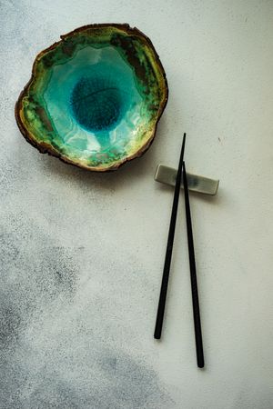 Ceramic blue bowl and Asian chopsticks