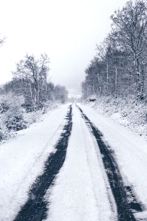 Winter snowy empty country road