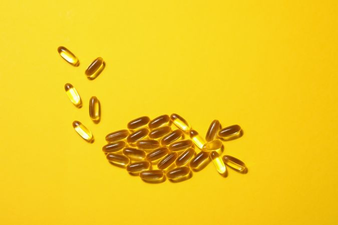 Omega pills in the shape of a fish