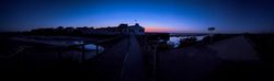Panoramic at twilight of the Tide Mill of Port de Loix, France