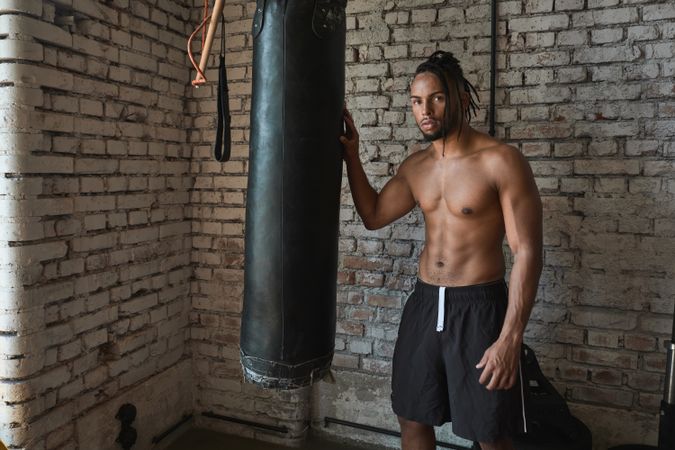 Confident Black boxer in gym