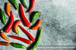 Spicy peppers on grey kitchen counter with space for text 5Q2VJX