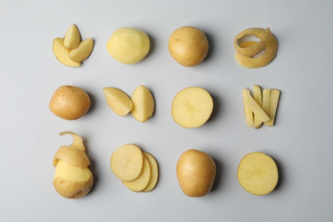 Potatoes cut in different ways arranged in rows