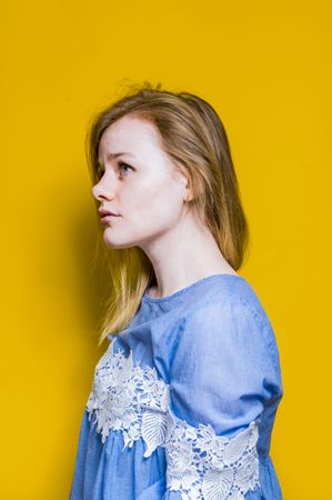 Blonde woman posing in studio