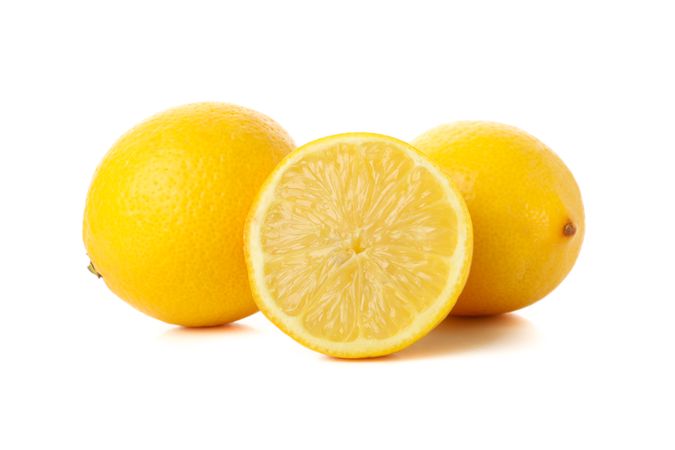 Fresh lemons isolated on light background. Ripe fruit
