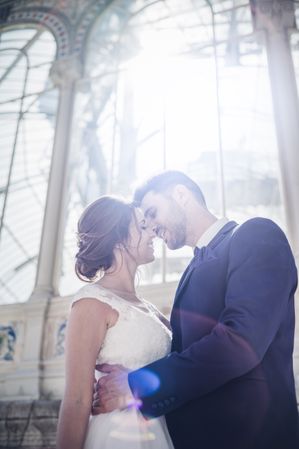 Newly weds having fun near vintage building
