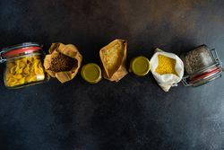 Top view of selection of dried pantry items on kitchen counter
