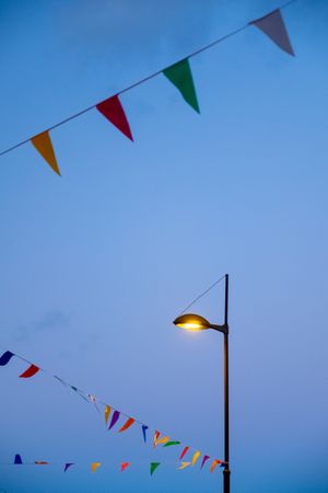 Lamp post and garlands in sky