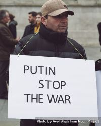 London, England, United Kingdom - March 5 2022: Man holding “Putin Stop War” sign bGOEeb