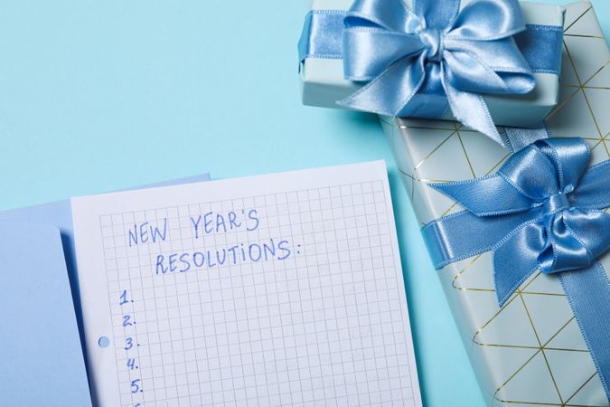 Concept of New Year Resolutions list, new year goals, close up