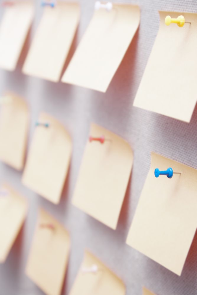 Sticky notes on a bulletin board