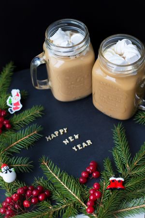 Christmas holiday background with hot cocoa marshmellou. The inscription Happy New Year