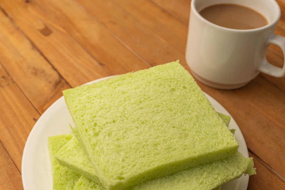 Soft pandan flavored bread and milk coffee