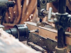 Lathe machine drilling wooden detail