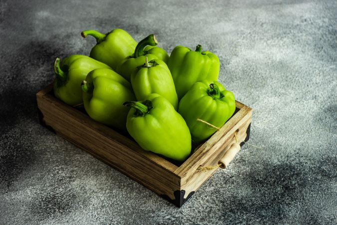 Basket of fresh green peppers