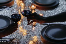 Wine glasses raised in a toast