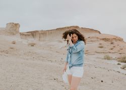Female tourist walking on sandy quarry