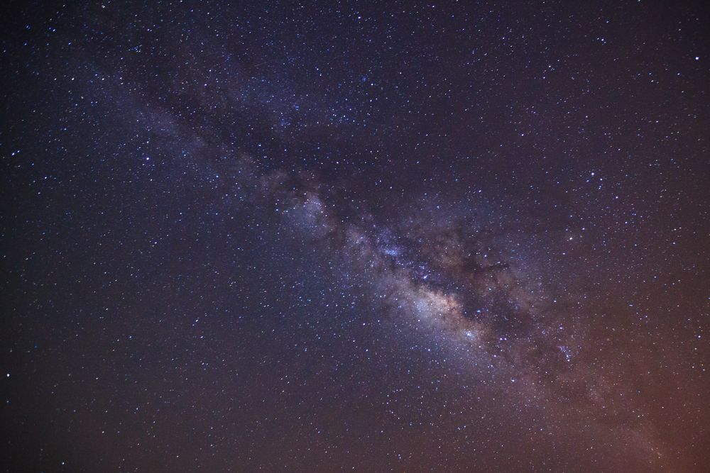 milky way galaxy with cloud and space dust in the universe, Long exposure photograph, with grain.