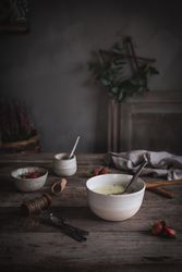 Strawberry porridge in bowl on table