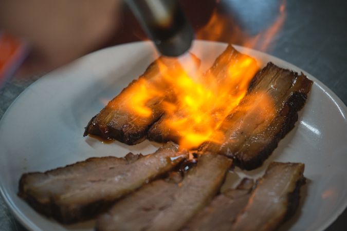 Chef Using Kitchen Blowtorch