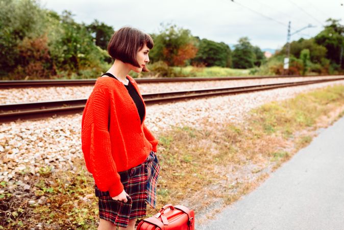 Woman standing at the train station
