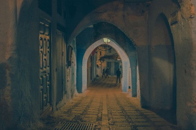 Old narrow street of town at night