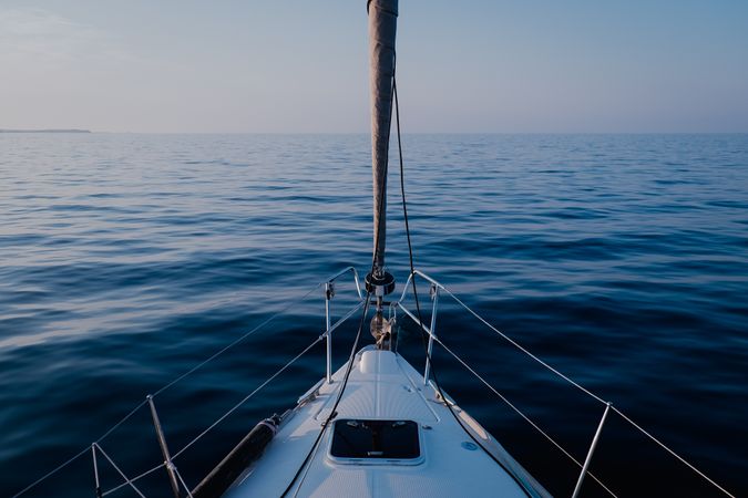 Sailboat in sea at dusk