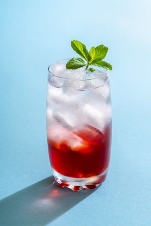 Iced water with grenadine syrup