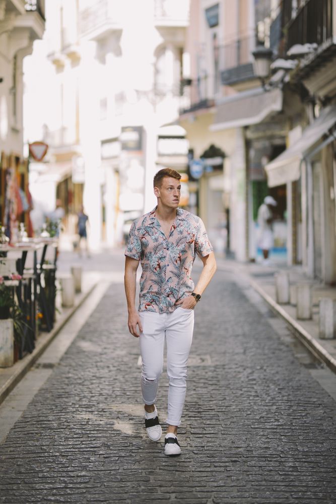 Handsome man standing on the street