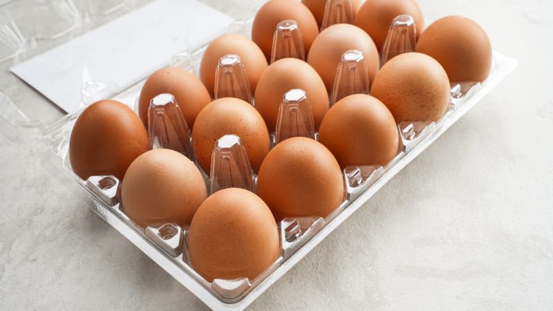 Organic chicken eggs in plastic packaging