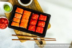 Top view of box of salmon & tuna sushi rolls 5ngQen