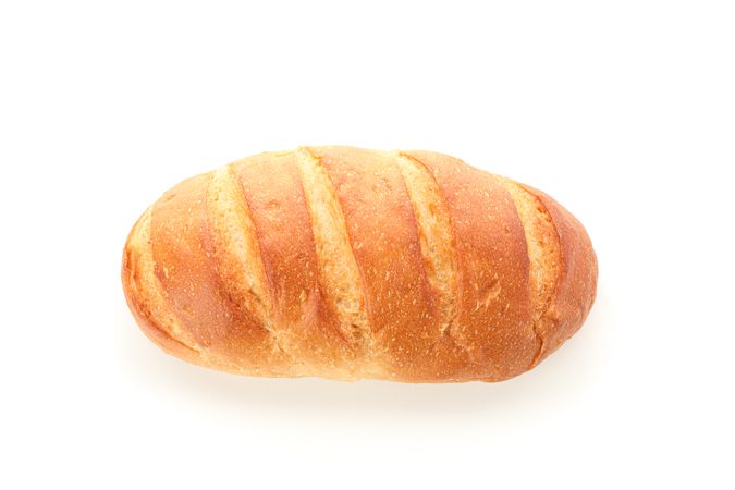Wheat bread isolated on plain background, top view. Bakery products