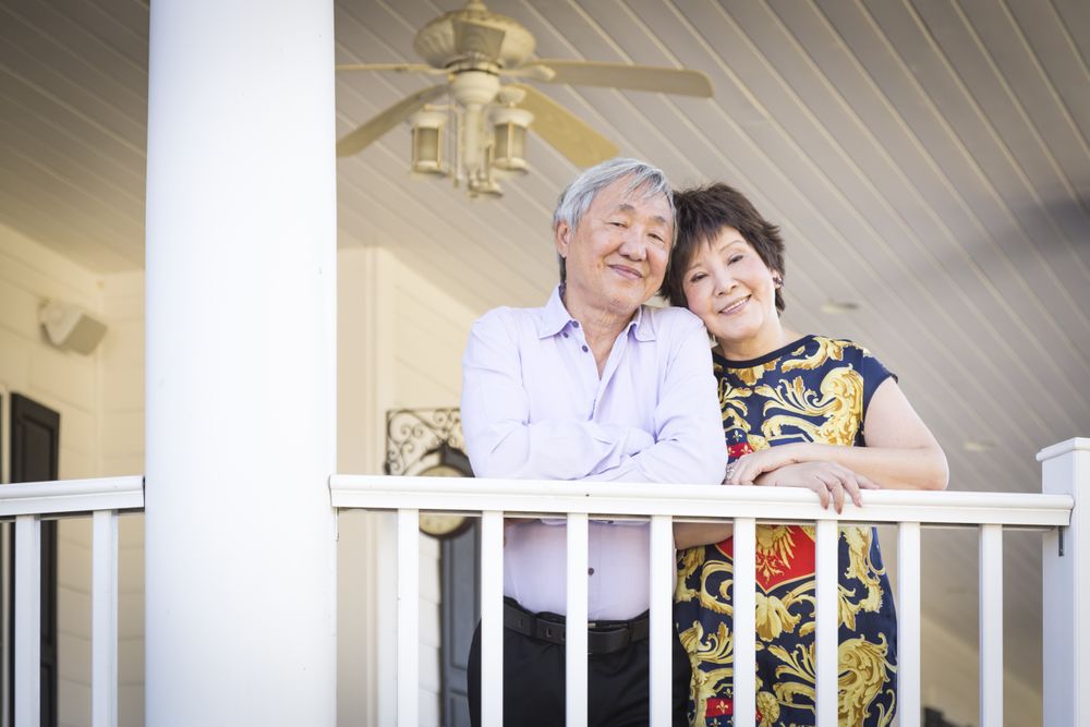 Chinese Couple Enjoying Their House