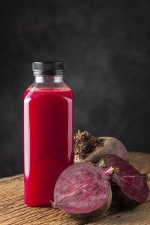 Red beet juice in plastic bottle.
