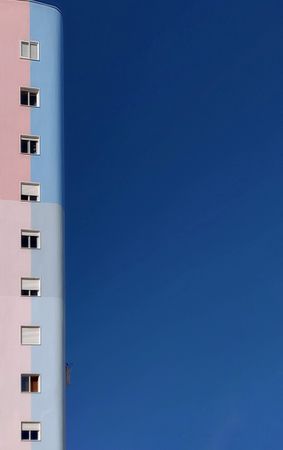 Pink building under clear blue sky