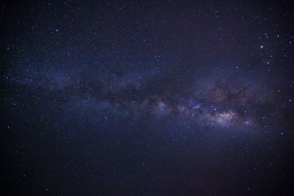 milky way galaxy and space dust in the universe, Long exposure photograph, with grain.