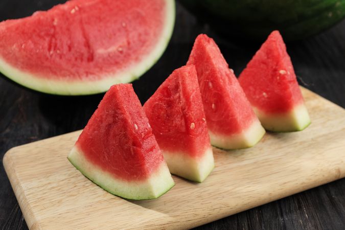 Slices of Watermelons on Cutting Board