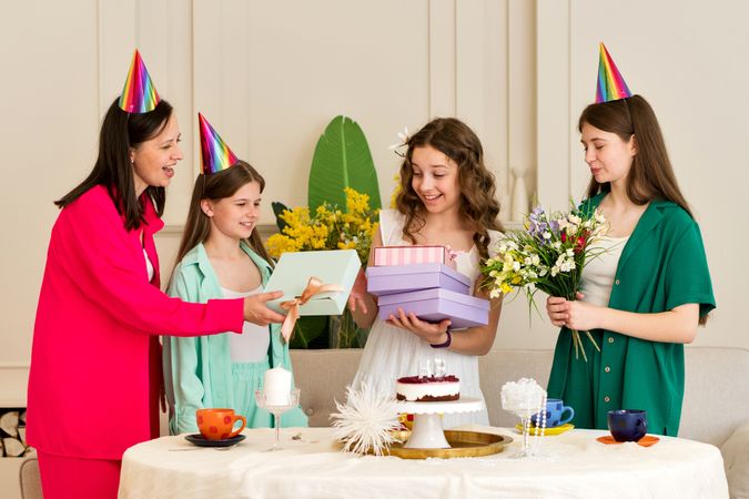 Birthday girl is surrounded by family and friends