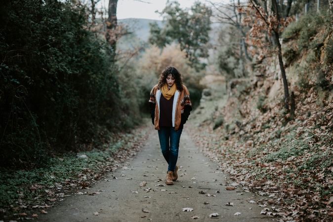 Young female hiking in forest