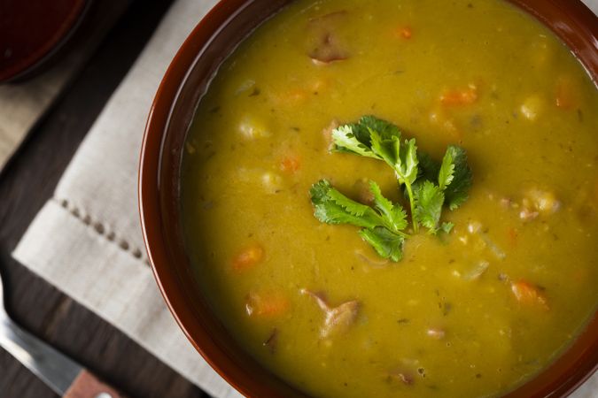 Pea soup. Bowl with pea soup on the table
