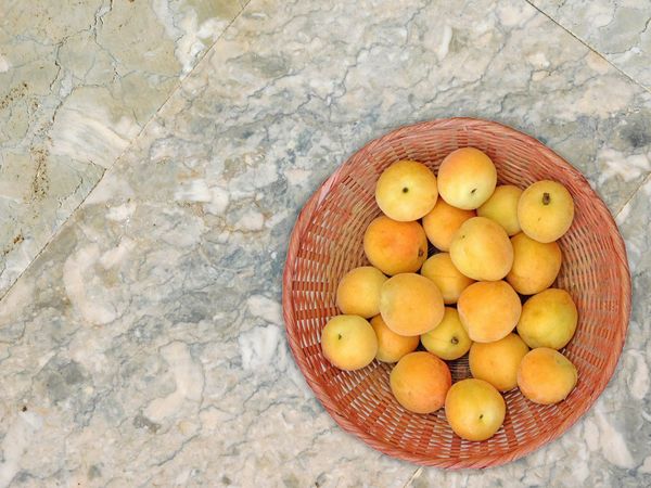 Apricots On Marble Background