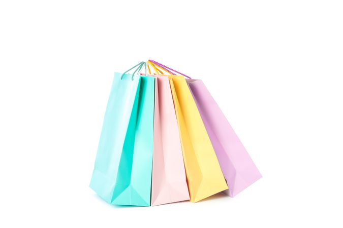 Multicolor paper bags isolated on blank background