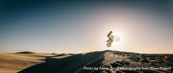 Motocross rider in midair during a ride 0LO2Pb