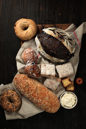 Top View Assortment Bakery Product on Black Wooden Background