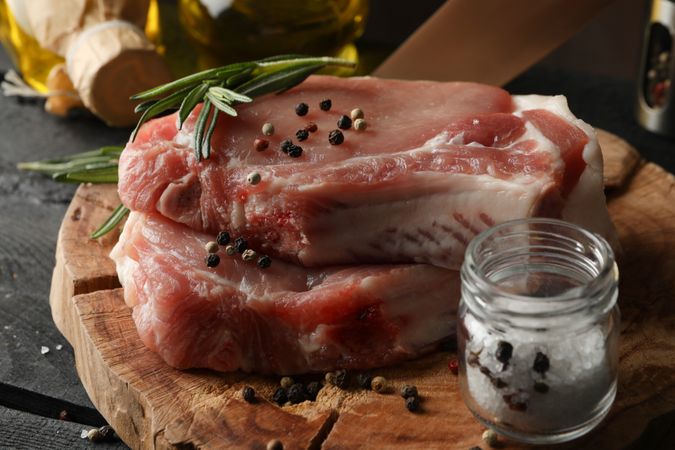 Composition with raw meat and ingredients. Cooking steak concept