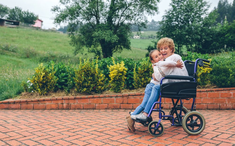 Granddaughter hugging her grandmother