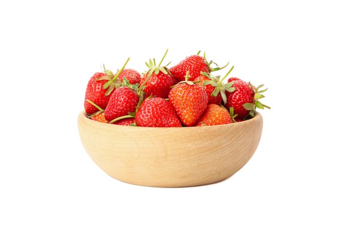 Bowl with tasty strawberry isolated on blank background. Summer berry